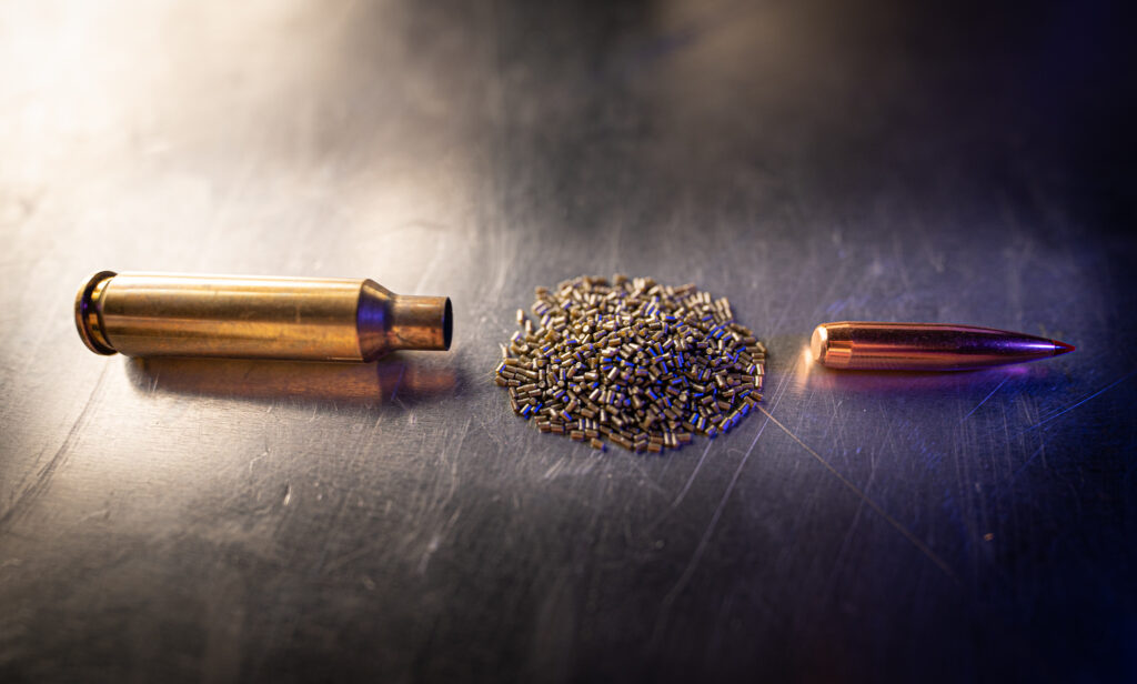 6.5 Creedmoor case, gun powder, and a bullet